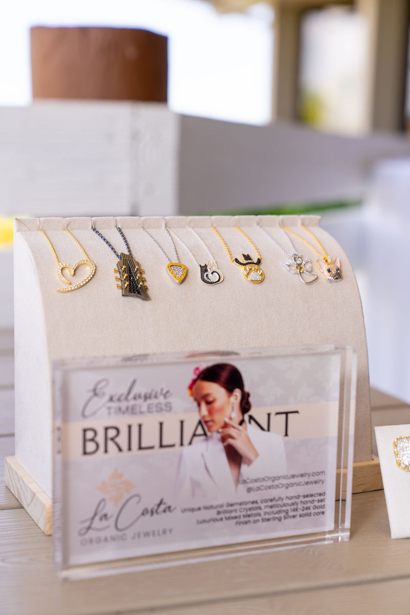 Charms and pendants created by La Costa for various nonprofit foundations, representing purpose-driven jewelry and philanthropic partnerships.